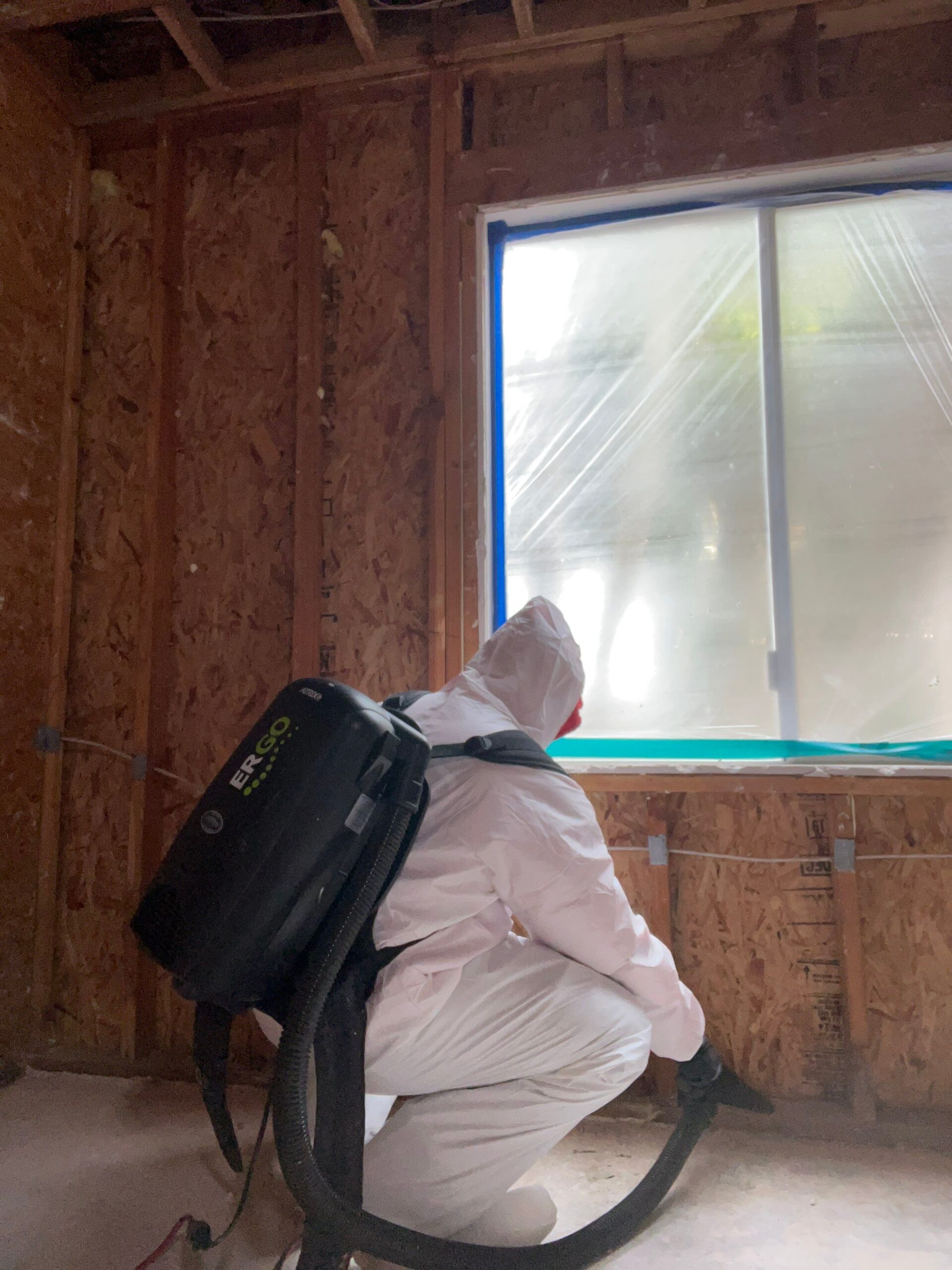 SOS Restoration technician using HEPA vacuum during mold remediation in Camarillo, CA